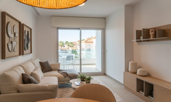 Obra nueva - Apartamento -
Playa Flamenca