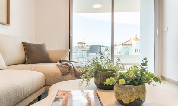 Obra nueva - Apartamento -
Playa Flamenca