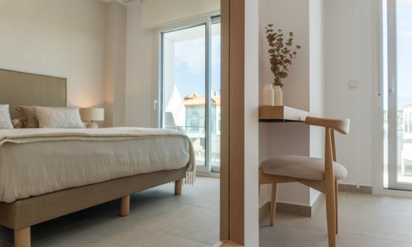 Obra nueva - Apartamento -
Playa Flamenca