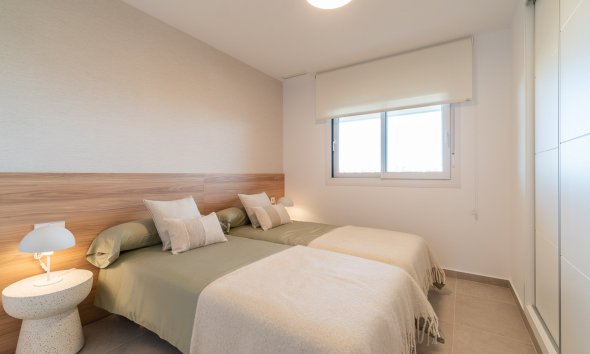 Obra nueva - Apartamento -
Playa Flamenca