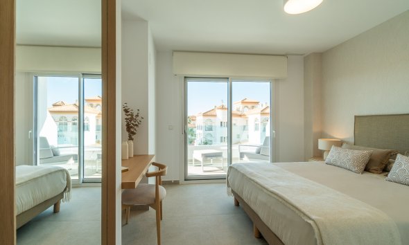 Obra nueva - Apartamento -
Playa Flamenca