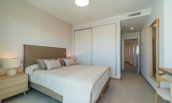 Obra nueva - Apartamento -
Playa Flamenca