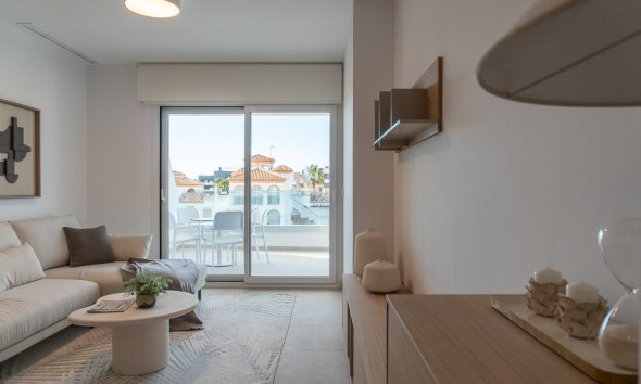 Obra nueva - Apartamento -
Playa Flamenca