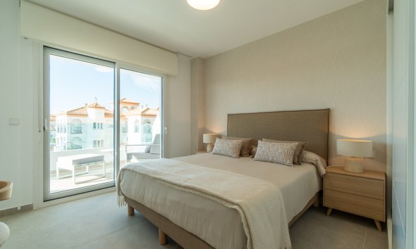 Obra nueva - Apartamento -
Playa Flamenca