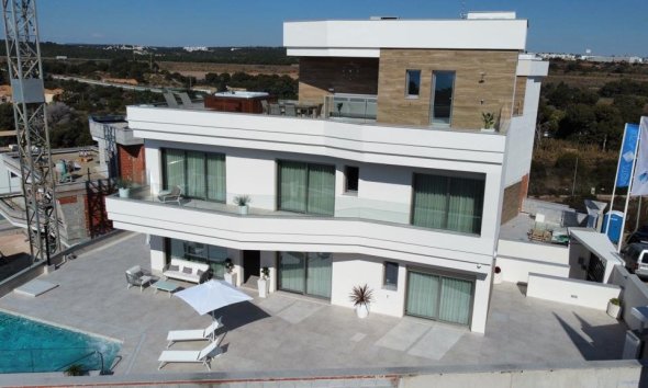 Obra nueva - Villa -
Orihuela Costa
