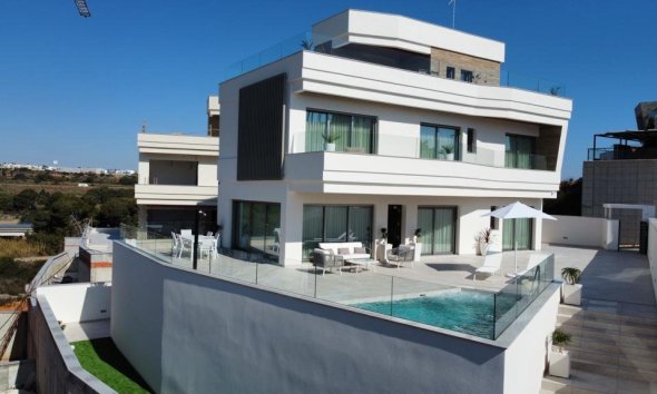Obra nueva - Villa -
Orihuela Costa