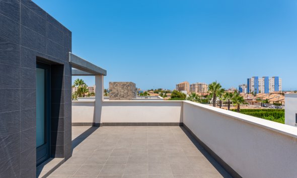 Obra nueva - Villa -
Playa Paraiso